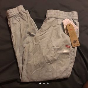 Ankle Jet set taper Levi’s, with zippers at ends